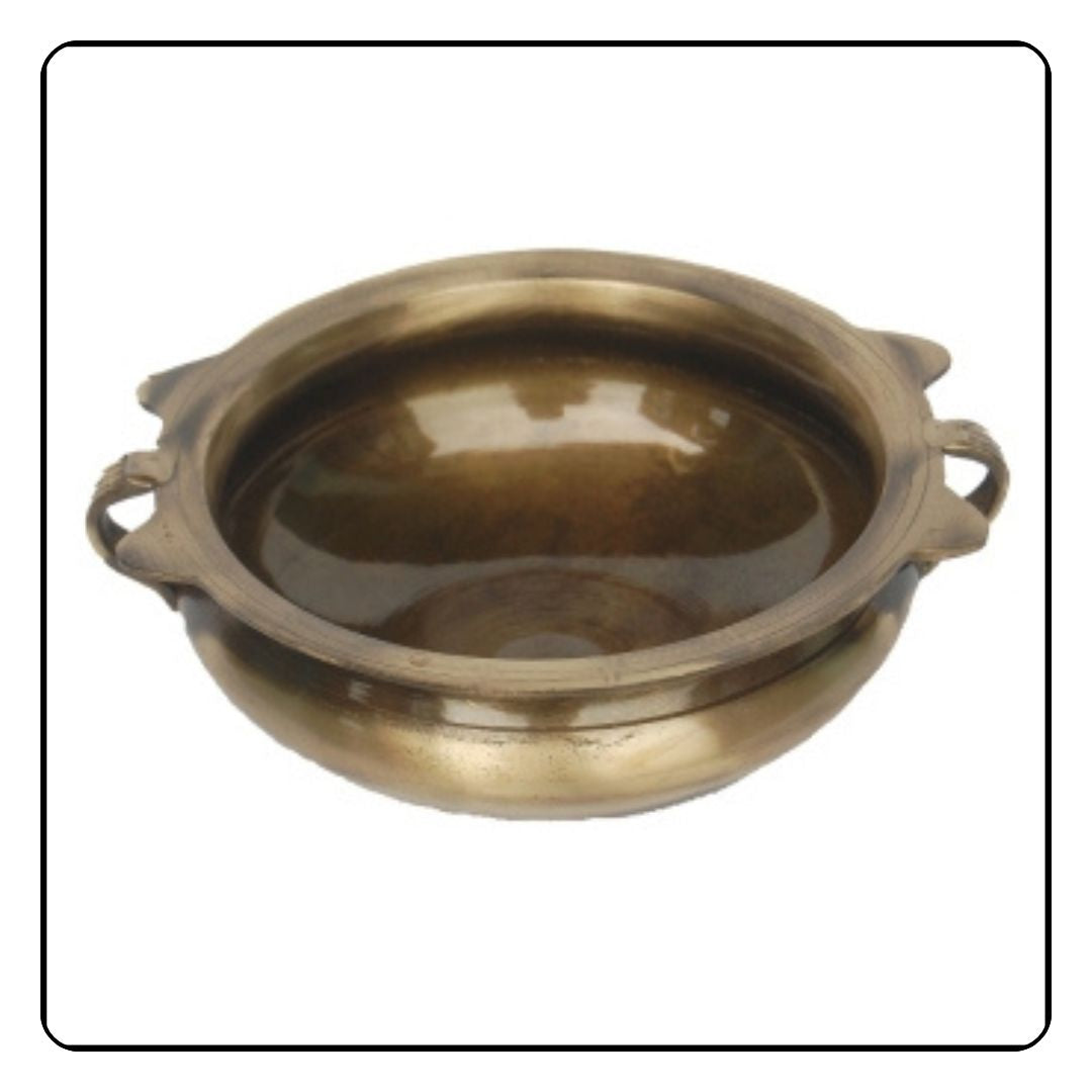 Beautifully crafted traditional brass urli with intricate floral designs, perfect for adding an elegant touch to your home decor.