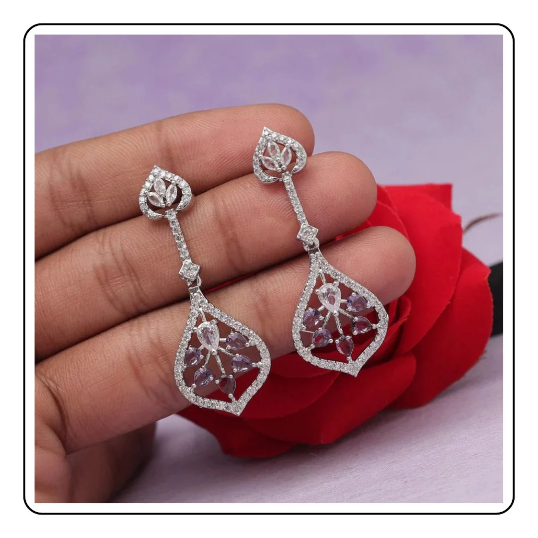 Purple stone earrings - LIMITED EDITION - Sattva Best of India - Purple stone earrings on hand image one