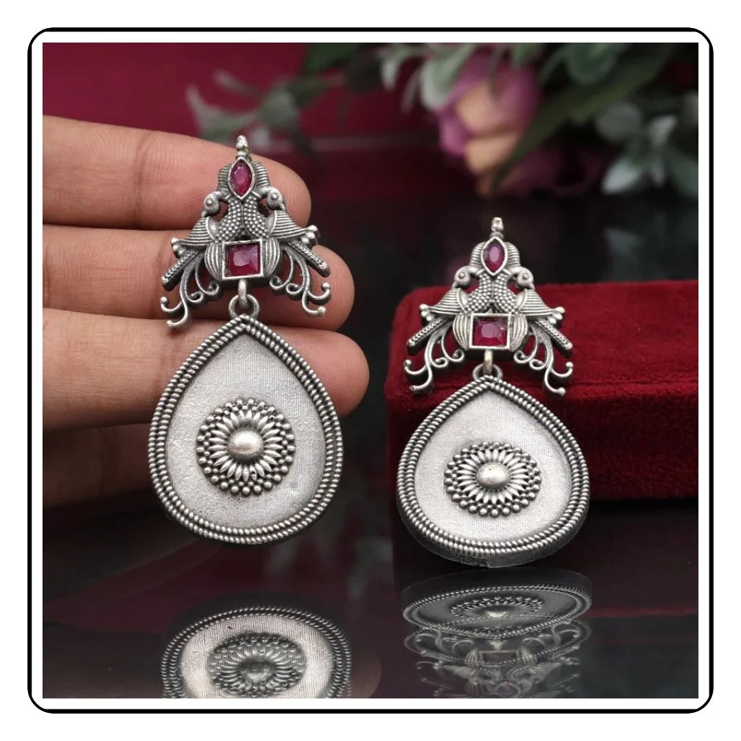 Elegant Rani and Silver Earrings by Sattva, showcasing traditional Indian craftsmanship.