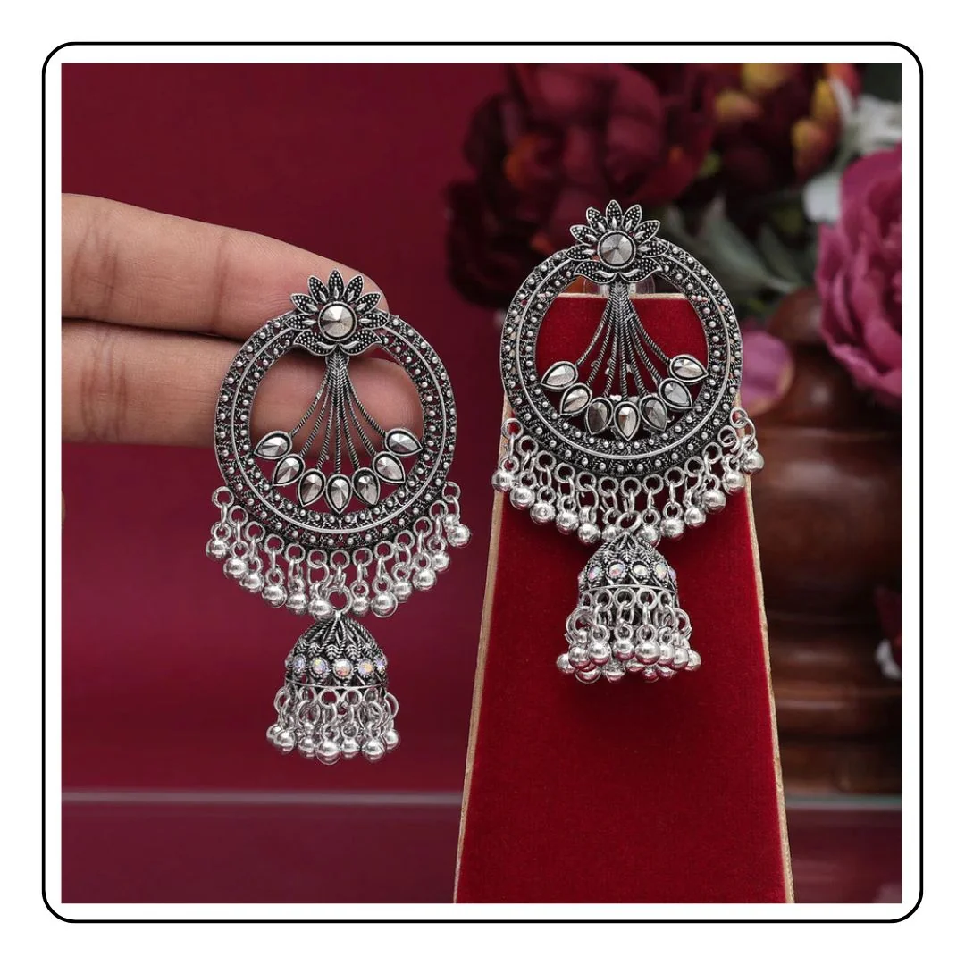 Silver Color Oxidised Earrings - LIMITED EDITION - Sattva Best of India - Silver Color Oxidised Earrings red background on hand